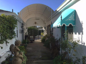 Image of a half dome canopy over a breezway on a home.